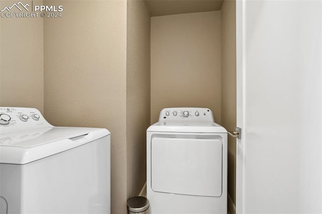 laundry area featuring independent washer and dryer