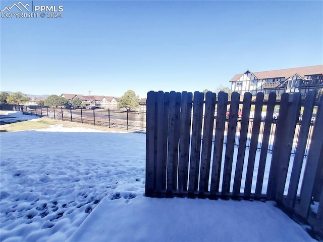 view of yard covered in snow