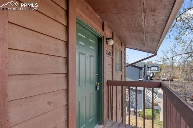 2526 Plumtree Grv, Colorado Springs, CO 80907 - doorway to property with a balcony