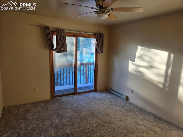 carpeted empty room featuring baseboard heating and ceiling fan