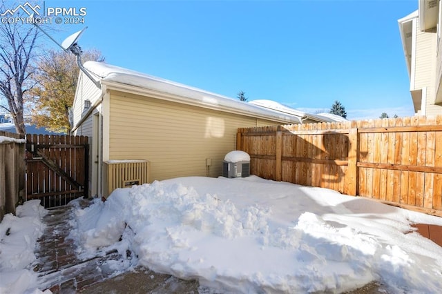 view of yard layered in snow