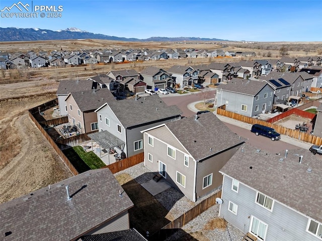 bird's eye view with a mountain view