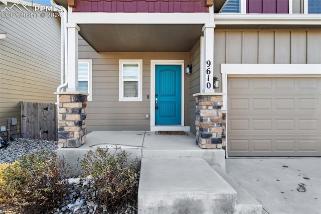 property entrance with a garage