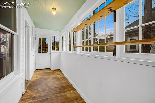 unfurnished sunroom featuring a healthy amount of sunlight