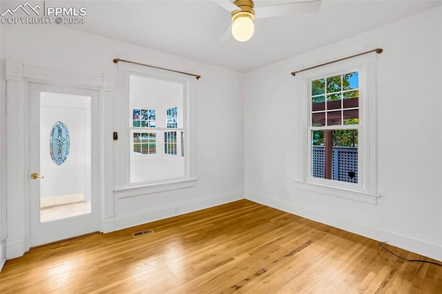 foyer featuring hardwood / wood-style floors and ceiling fan