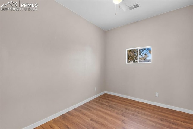 empty room featuring hardwood / wood-style flooring