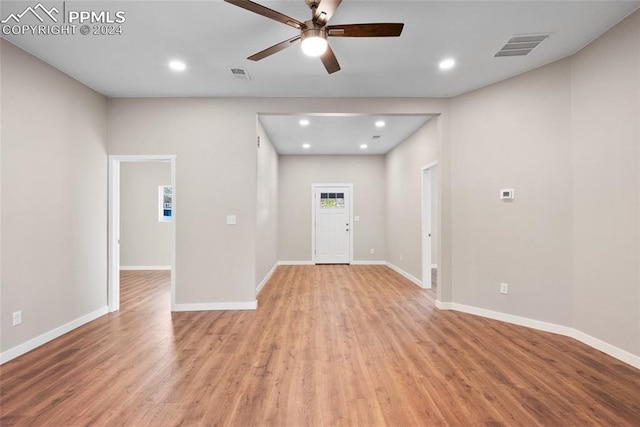 entryway with light hardwood / wood-style flooring and ceiling fan