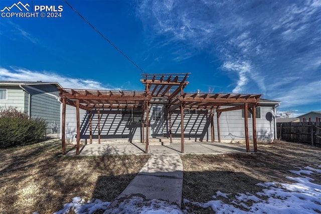 exterior space featuring a pergola and a patio area