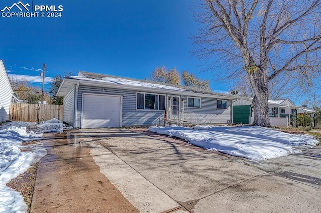 view of front of house with a garage