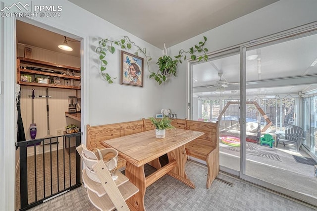 1511 N Chelton Rd, Colorado Springs, CO 80909 - dining room with ceiling fan and vaulted ceiling