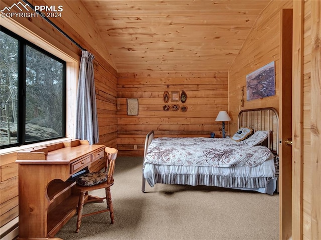 carpeted bedroom featuring wood walls, lofted ceiling, and wooden ceiling