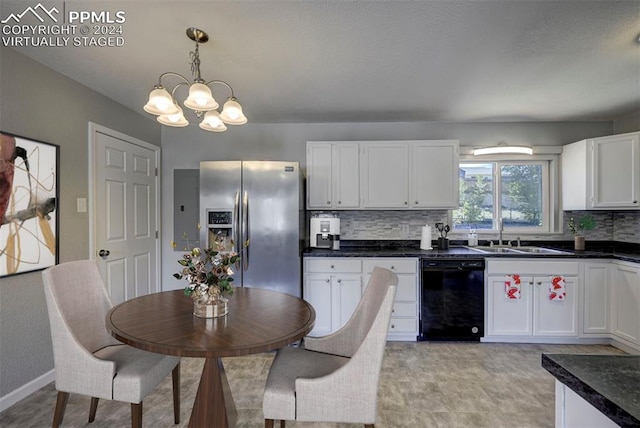 kitchen featuring pendant lighting, stainless steel refrigerator with ice dispenser, sink, white cabinets, and dishwasher