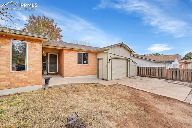 view of front of home with a garage