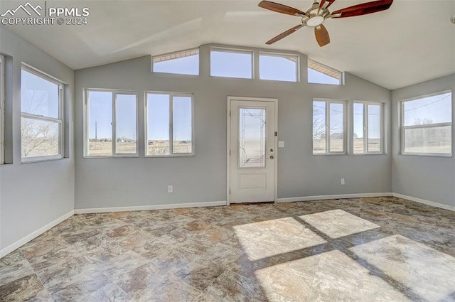 unfurnished sunroom featuring vaulted ceiling and ceiling fan