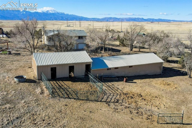 bird's eye view with a mountain view and a rural view