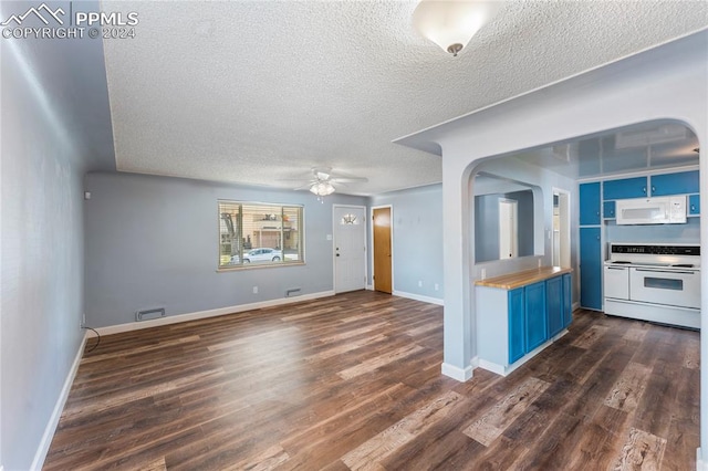 interior space with ceiling fan, dark wood-type flooring, white appliances, and blue cabinets