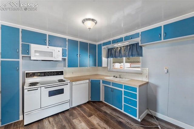 kitchen featuring dark hardwood / wood-style floors, sink, white appliances, and blue cabinetry