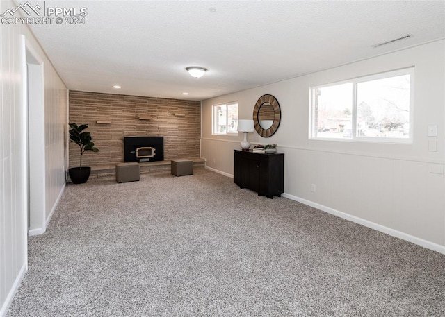 unfurnished living room with carpet floors