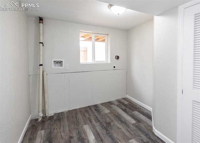 washroom featuring hookup for a washing machine and dark hardwood / wood-style flooring