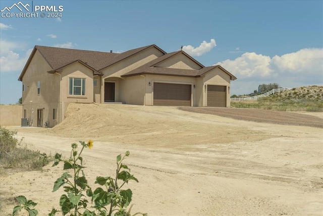 view of front of home featuring a garage