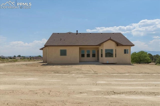 back of property featuring a patio