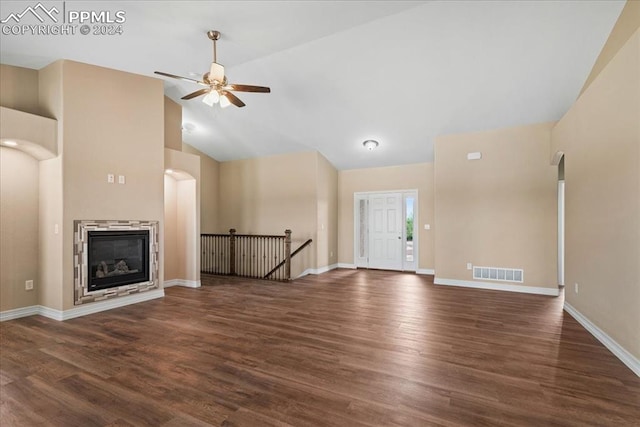 unfurnished living room featuring ceiling fan, high vaulted ceiling, and dark hardwood / wood-style flooring