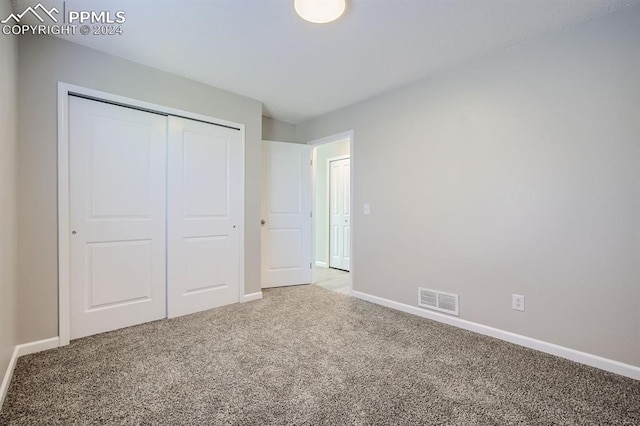 966 Daffodil St, Fountain, CO 80817 - unfurnished bedroom with carpet floors, baseboards, and a closet