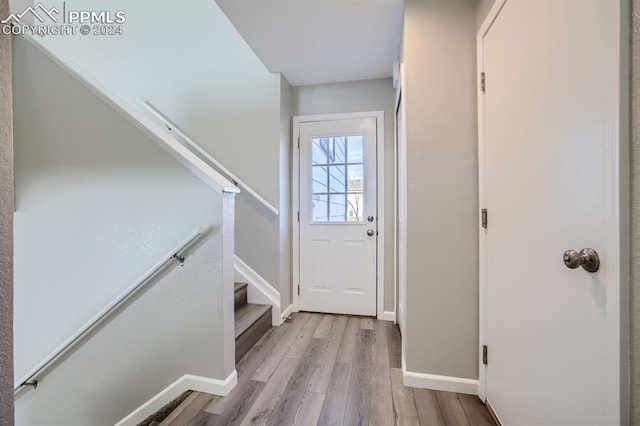 entryway with light hardwood / wood-style flooring