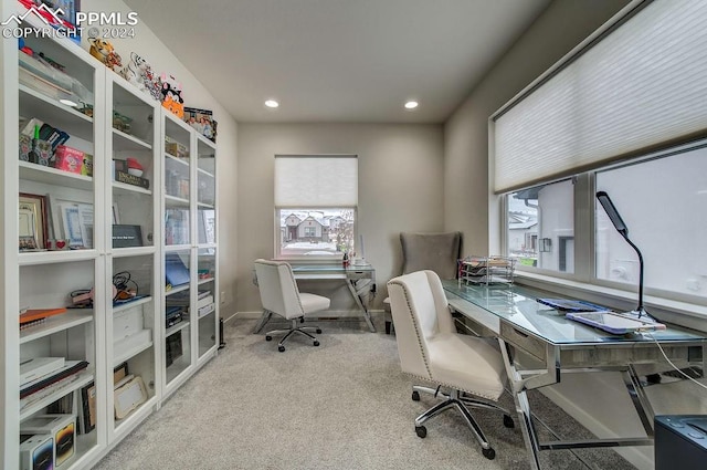 office area with carpet flooring and a wealth of natural light