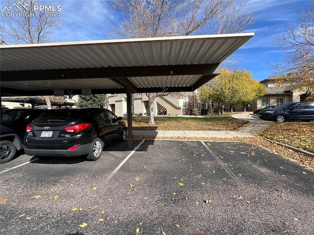 view of parking with a carport