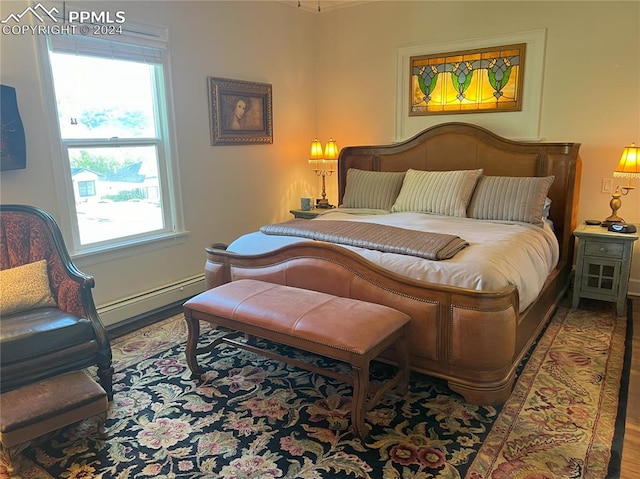 bedroom with hardwood / wood-style floors