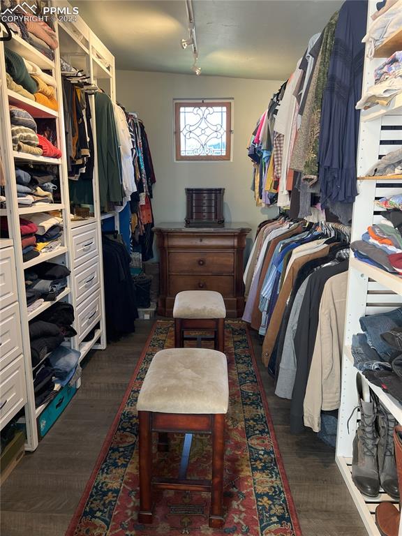 822 Willow St, Trinidad, CO 81082 - spacious closet featuring dark wood-style flooring