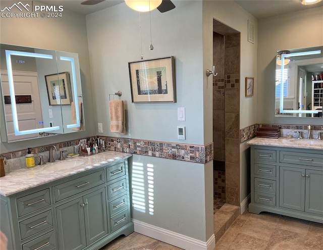 822 Willow St, Trinidad, CO 81082 - bathroom featuring ceiling fan, a tile shower, and vanity