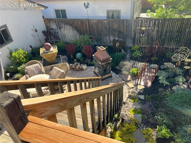 822 Willow St, Trinidad, CO 81082 - wooden deck with a fenced backyard and outdoor dining area