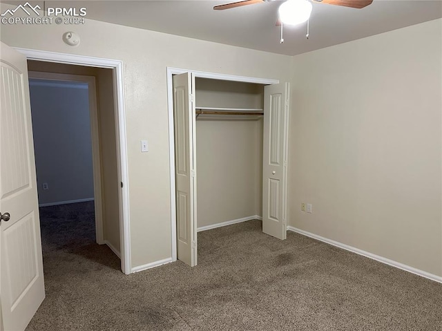 unfurnished bedroom featuring carpet, ceiling fan, and a closet