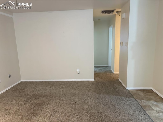 empty room featuring carpet