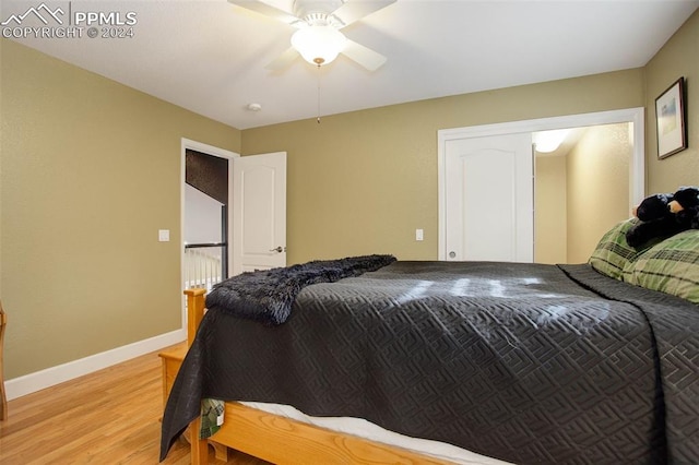 bedroom featuring ceiling fan and light hardwood / wood-style floors