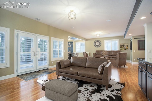 living room with light hardwood / wood-style floors