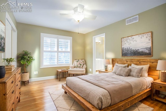 bedroom featuring ceiling fan and light hardwood / wood-style flooring