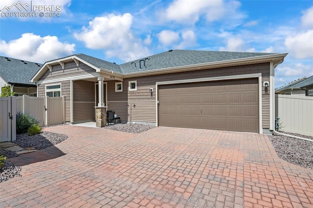 view of front of property featuring a garage