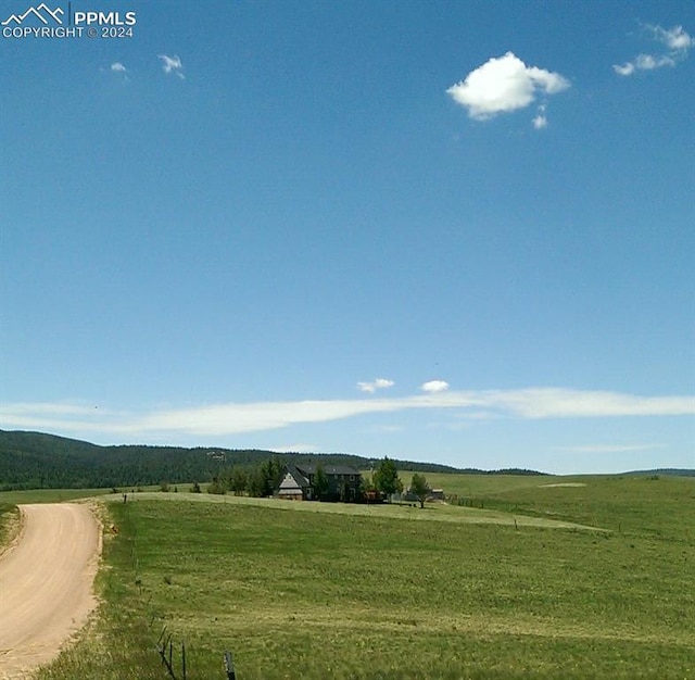 exterior space with a rural view