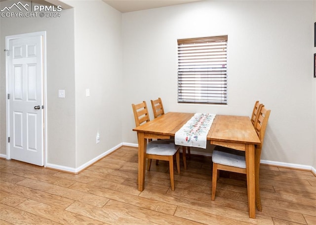 1441 Kempton Aly, Colorado Springs, CO 80910 - dining space featuring light wood-type flooring and baseboards