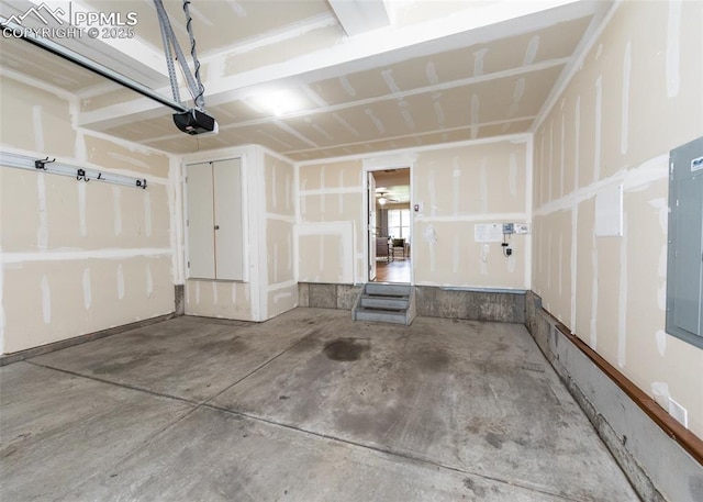 1441 Kempton Aly, Colorado Springs, CO 80910 - garage featuring a garage door opener