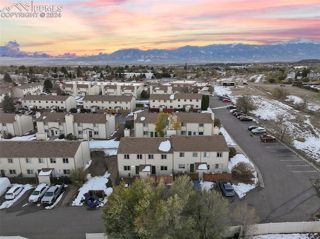 aerial view at dusk with a mountain view