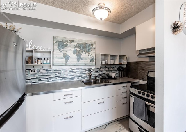 kitchen featuring decorative backsplash, white cabinetry, sink, and stainless steel appliances