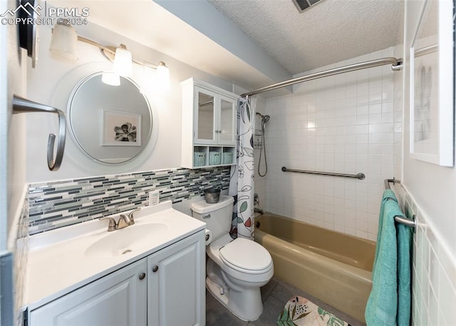 full bathroom featuring vanity, tile patterned floors, tasteful backsplash, a textured ceiling, and shower / tub combo with curtain