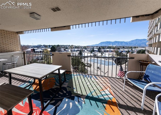 balcony with a mountain view