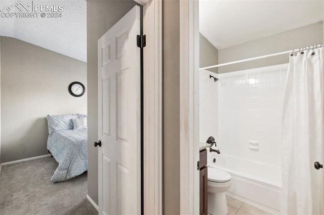 bathroom with tile patterned flooring, shower / bath combo, toilet, and lofted ceiling