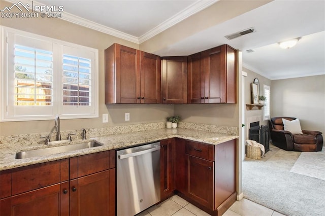 kitchen featuring light stone counters, stainless steel dishwasher, light colored carpet, crown molding, and sink