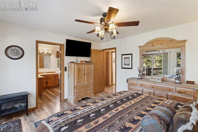 bedroom with access to exterior, light wood-type flooring, ensuite bathroom, and ceiling fan